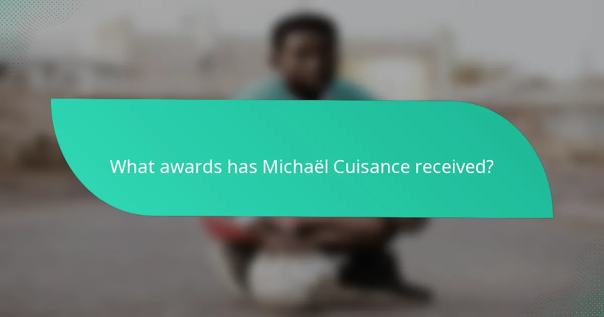 What awards has Michaël Cuisance received?